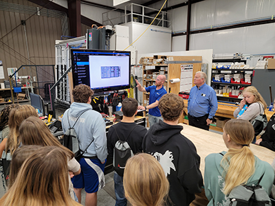 Manufacturing Day Students learning about our panel build process